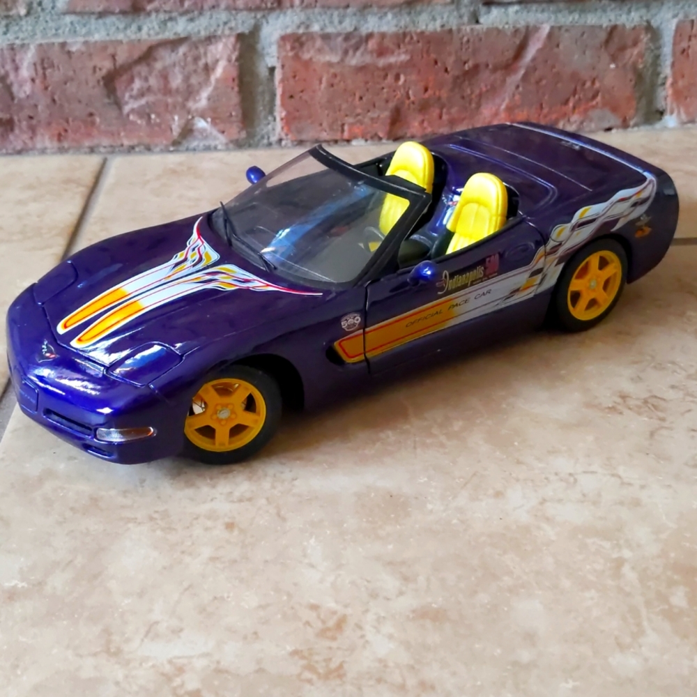 Vibrant Purple Convertible Toy Car with Yellow Wheels